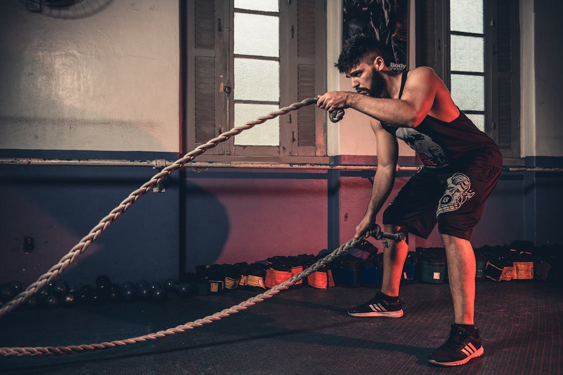 Personal trainer welcoming new client for first session